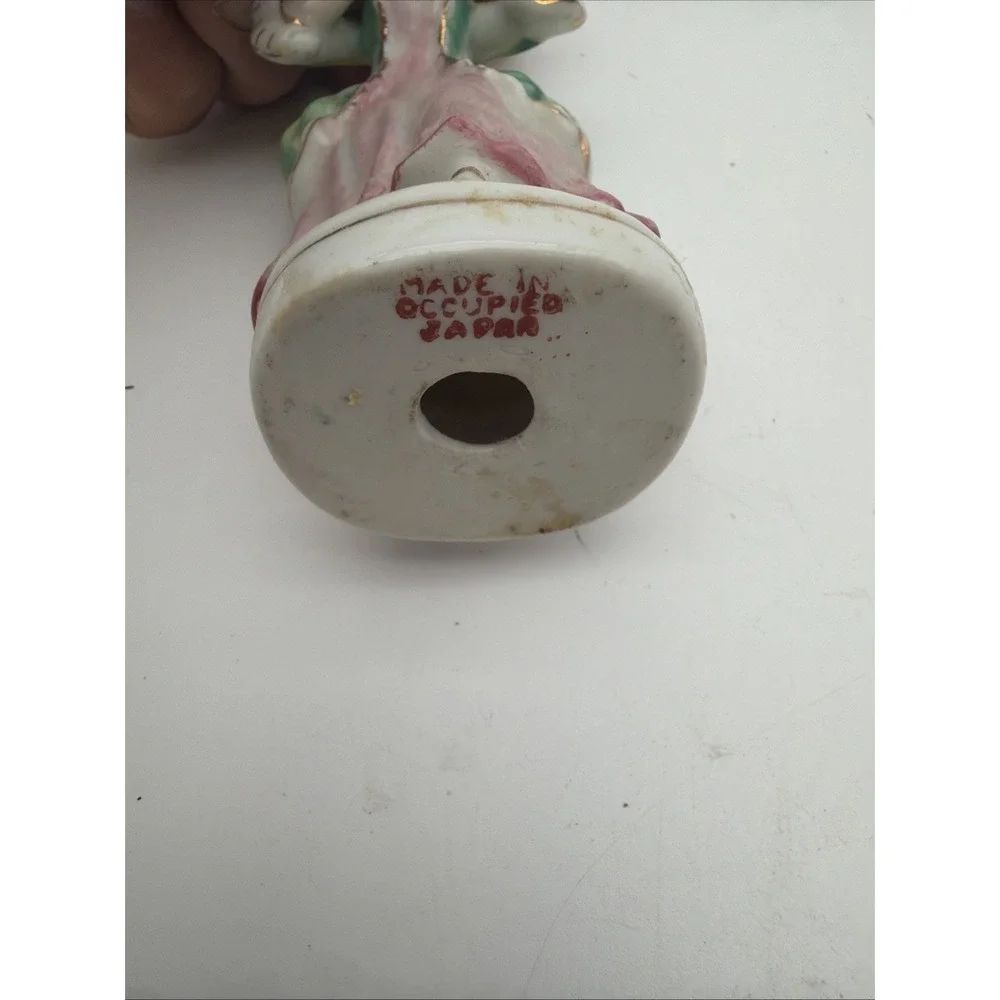 vintage hand-painted porcelain colonial or Victorian lady figurine